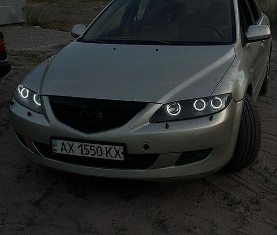 Бежевий Мазда 6, об'ємом двигуна 2 л та пробігом 245 тис. км за 2400 $, фото 1 на Automoto.ua