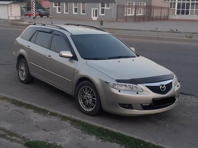 Бежевый Мазда 6, объемом двигателя 2 л и пробегом 235 тыс. км за 4100 $, фото 1 на Automoto.ua