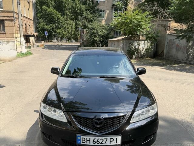 Черный Мазда 6, объемом двигателя 2 л и пробегом 232 тыс. км за 4200 $, фото 1 на Automoto.ua