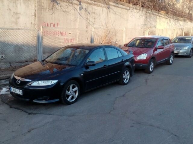 Чорний Мазда 6, об'ємом двигуна 1.8 л та пробігом 180 тис. км за 1099 $, фото 1 на Automoto.ua