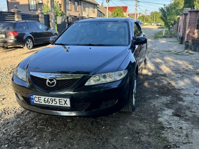 Черный Мазда 6, объемом двигателя 2 л и пробегом 200 тыс. км за 3800 $, фото 1 на Automoto.ua