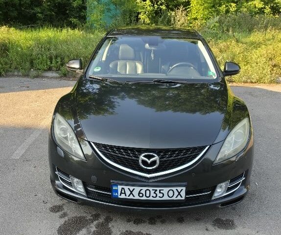 Чорний Мазда 6, об'ємом двигуна 2 л та пробігом 301 тис. км за 3495 $, фото 1 на Automoto.ua