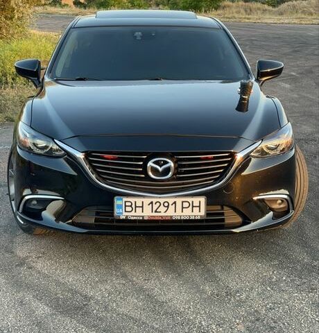 Черный Мазда 6, объемом двигателя 2.5 л и пробегом 210 тыс. км за 13808 $, фото 1 на Automoto.ua