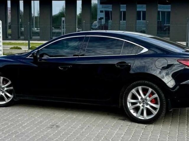 Чорний Мазда 6, об'ємом двигуна 2.5 л та пробігом 276 тис. км за 8705 $, фото 1 на Automoto.ua