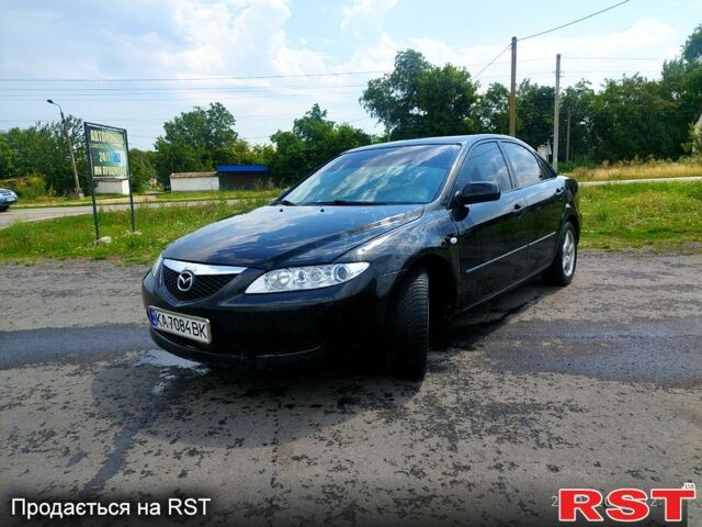 Черный Мазда 6, объемом двигателя 1.8 л и пробегом 346 тыс. км за 3500 $, фото 1 на Automoto.ua