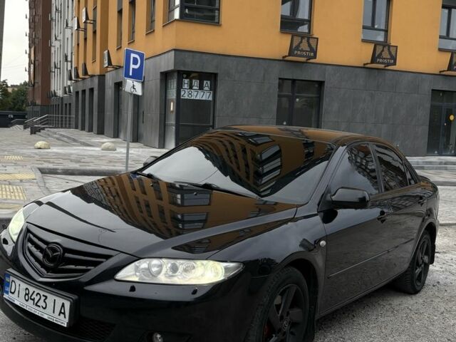 Черный Мазда 6, объемом двигателя 2.3 л и пробегом 303 тыс. км за 3800 $, фото 1 на Automoto.ua