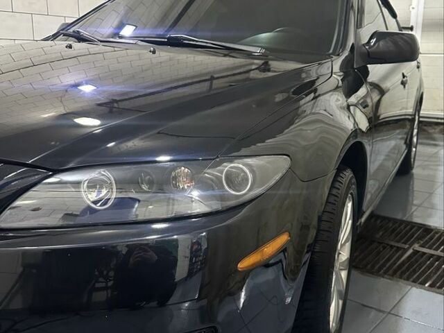 Черный Мазда 6, объемом двигателя 2.3 л и пробегом 355 тыс. км за 5200 $, фото 1 на Automoto.ua