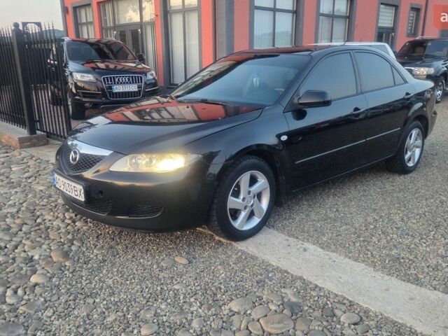 Черный Мазда 6, объемом двигателя 2 л и пробегом 304 тыс. км за 2600 $, фото 1 на Automoto.ua