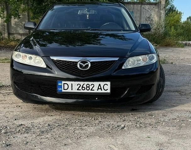 Черный Мазда 6, объемом двигателя 2 л и пробегом 285 тыс. км за 3500 $, фото 1 на Automoto.ua