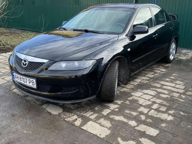 Черный Мазда 6, объемом двигателя 2 л и пробегом 326 тыс. км за 4500 $, фото 1 на Automoto.ua