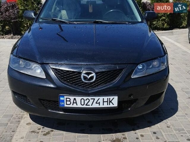 Черный Мазда 6, объемом двигателя 2 л и пробегом 303 тыс. км за 3600 $, фото 1 на Automoto.ua