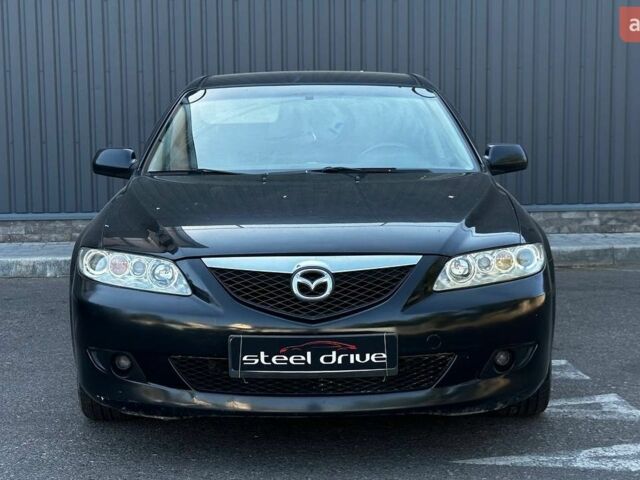 Черный Мазда 6, объемом двигателя 2 л и пробегом 327 тыс. км за 3199 $, фото 1 на Automoto.ua