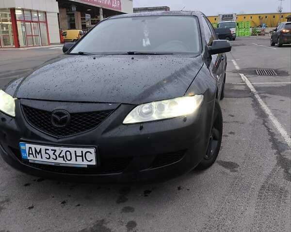 Черный Мазда 6, объемом двигателя 2 л и пробегом 390 тыс. км за 3500 $, фото 1 на Automoto.ua