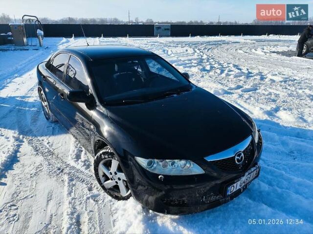 Черный Мазда 6, объемом двигателя 2 л и пробегом 330 тыс. км за 3300 $, фото 1 на Automoto.ua