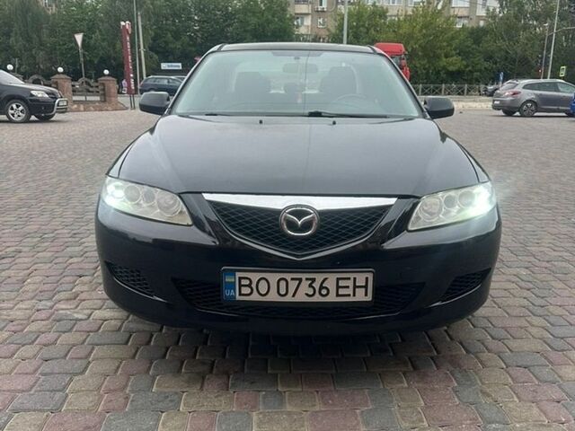 Черный Мазда 6, объемом двигателя 2 л и пробегом 300 тыс. км за 3777 $, фото 1 на Automoto.ua
