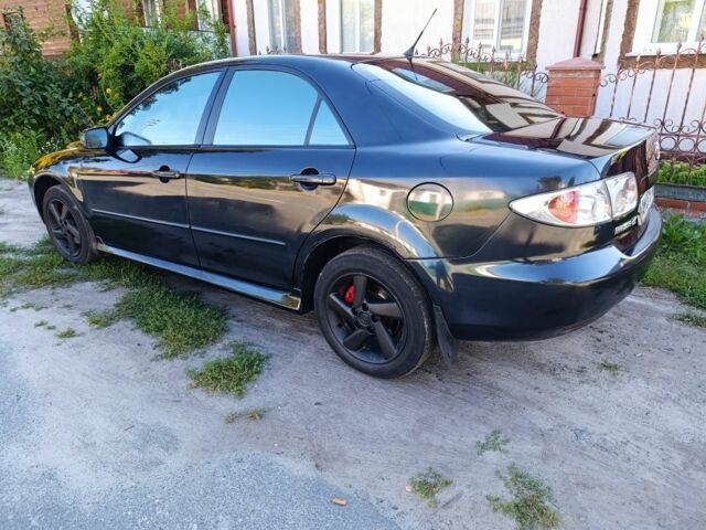 Черный Мазда 6, объемом двигателя 2 л и пробегом 350 тыс. км за 2999 $, фото 1 на Automoto.ua