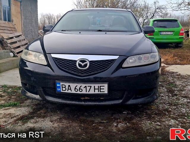 Черный Мазда 6, объемом двигателя 2.3 л и пробегом 280 тыс. км за 3200 $, фото 1 на Automoto.ua