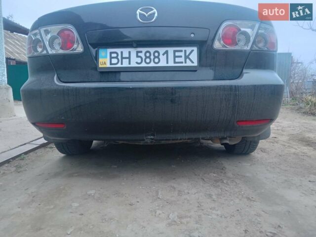 Черный Мазда 6, объемом двигателя 2 л и пробегом 281 тыс. км за 4100 $, фото 1 на Automoto.ua