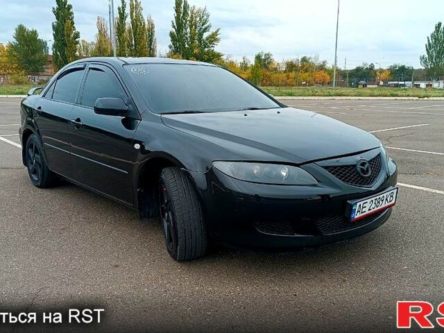 Черный Мазда 6, объемом двигателя 2 л и пробегом 300 тыс. км за 3900 $, фото 1 на Automoto.ua