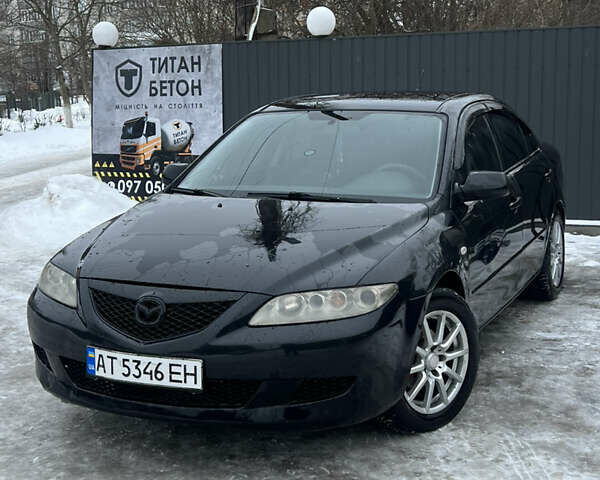 Черный Мазда 6, объемом двигателя 2 л и пробегом 420 тыс. км за 3800 $, фото 1 на Automoto.ua