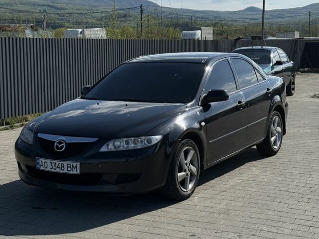 Черный Мазда 6, объемом двигателя 1.8 л и пробегом 180 тыс. км за 3500 $, фото 1 на Automoto.ua