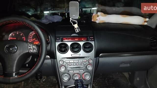 Черный Мазда 6, объемом двигателя 2 л и пробегом 317 тыс. км за 3000 $, фото 1 на Automoto.ua