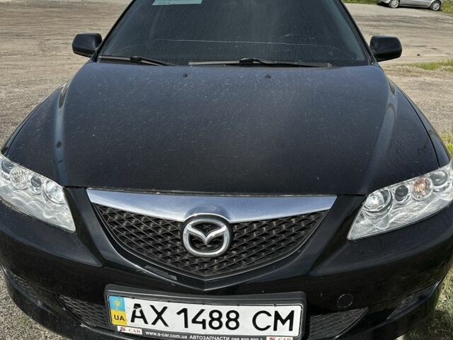 Черный Мазда 6, объемом двигателя 1.8 л и пробегом 300 тыс. км за 4500 $, фото 1 на Automoto.ua