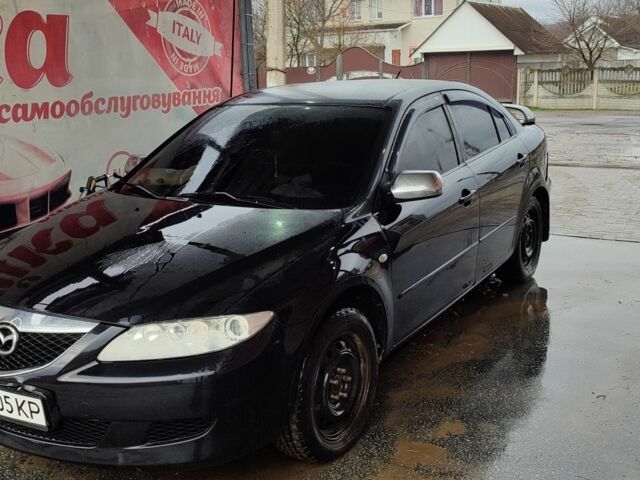 Черный Мазда 6, объемом двигателя 2 л и пробегом 317 тыс. км за 3000 $, фото 1 на Automoto.ua