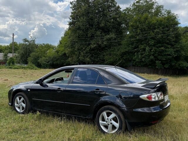 Черный Мазда 6, объемом двигателя 2 л и пробегом 280 тыс. км за 2400 $, фото 1 на Automoto.ua