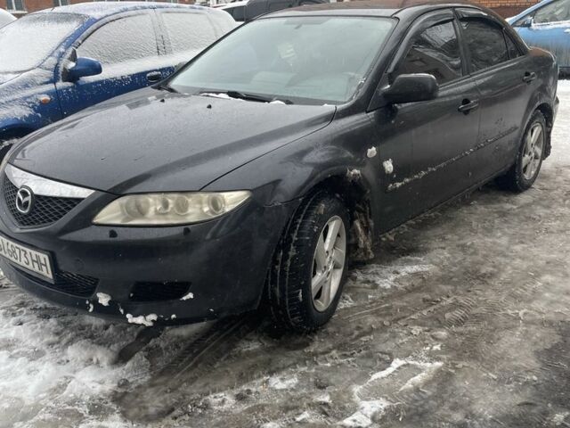 Черный Мазда 6, объемом двигателя 2 л и пробегом 240 тыс. км за 4000 $, фото 1 на Automoto.ua
