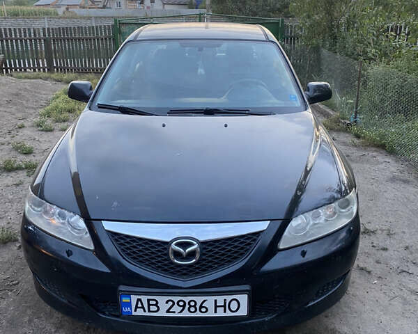 Черный Мазда 6, объемом двигателя 2.26 л и пробегом 284 тыс. км за 4500 $, фото 1 на Automoto.ua