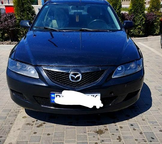 Черный Мазда 6, объемом двигателя 2 л и пробегом 303 тыс. км за 4200 $, фото 1 на Automoto.ua