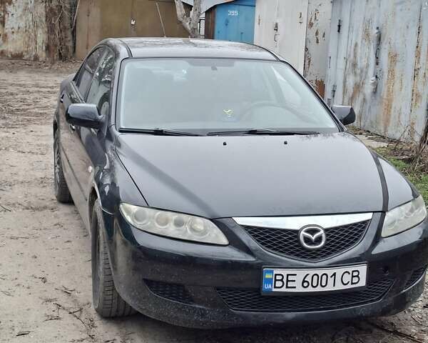 Черный Мазда 6, объемом двигателя 2 л и пробегом 200 тыс. км за 2000 $, фото 1 на Automoto.ua