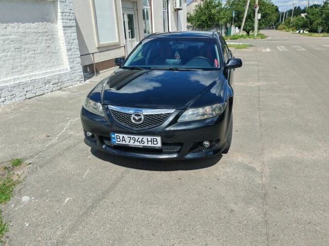 Черный Мазда 6, объемом двигателя 2 л и пробегом 306 тыс. км за 3507 $, фото 1 на Automoto.ua