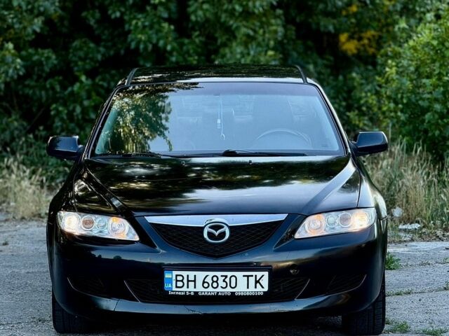 Черный Мазда 6, объемом двигателя 2 л и пробегом 200 тыс. км за 3999 $, фото 1 на Automoto.ua