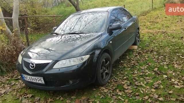 Черный Мазда 6, объемом двигателя 1.8 л и пробегом 350 тыс. км за 2500 $, фото 1 на Automoto.ua