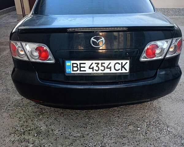 Черный Мазда 6, объемом двигателя 2 л и пробегом 245 тыс. км за 4999 $, фото 1 на Automoto.ua