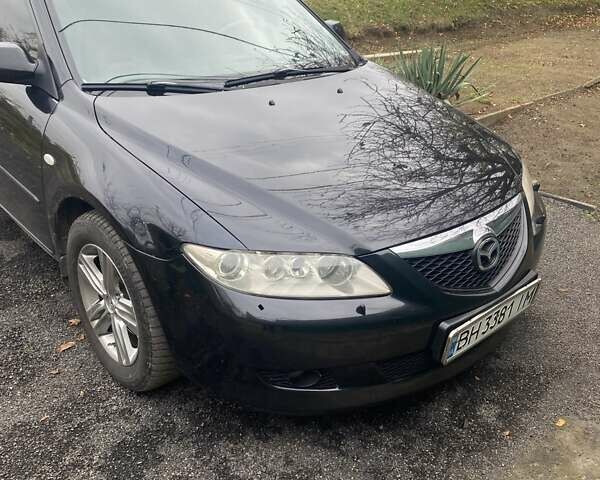 Черный Мазда 6, объемом двигателя 2 л и пробегом 416 тыс. км за 4800 $, фото 1 на Automoto.ua