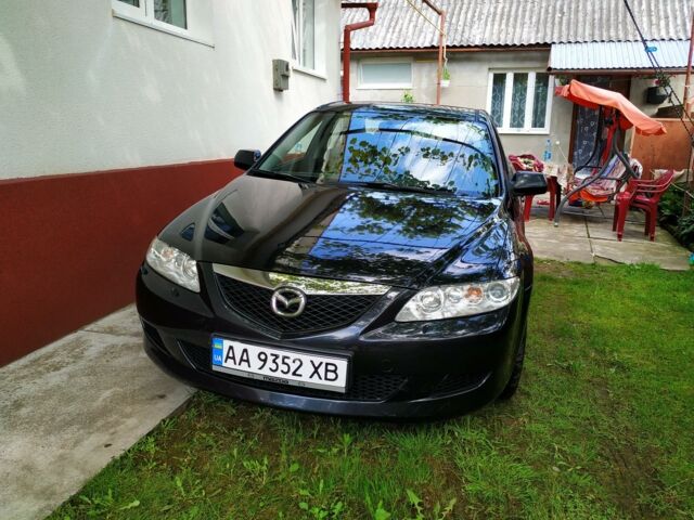 Чорний Мазда 6, об'ємом двигуна 2 л та пробігом 179 тис. км за 6599 $, фото 1 на Automoto.ua
