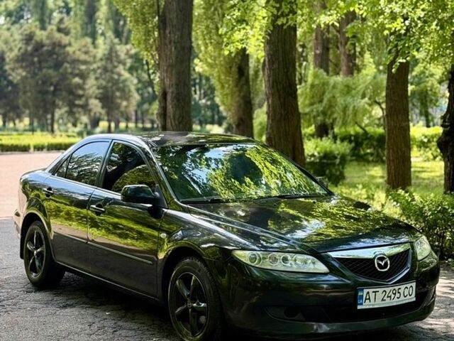 Черный Мазда 6, объемом двигателя 1.8 л и пробегом 395 тыс. км за 3200 $, фото 1 на Automoto.ua
