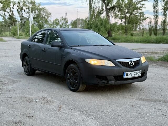 Черный Мазда 6, объемом двигателя 2 л и пробегом 311 тыс. км за 1699 $, фото 1 на Automoto.ua