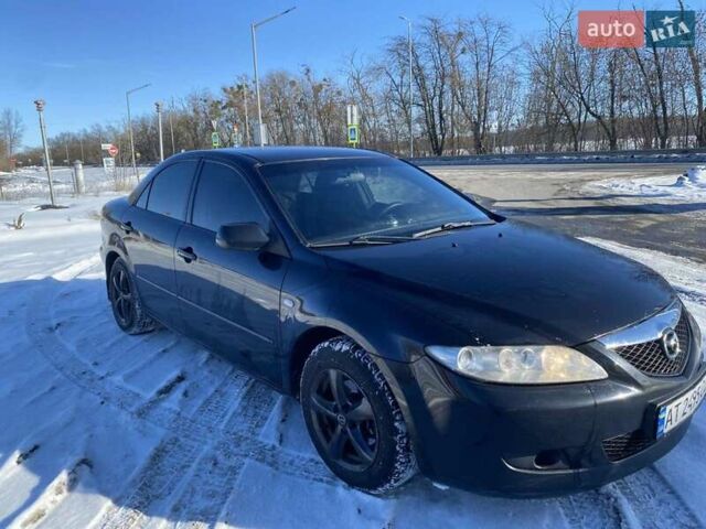 Черный Мазда 6, объемом двигателя 1.8 л и пробегом 260 тыс. км за 3600 $, фото 1 на Automoto.ua