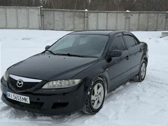 Чорний Мазда 6, об'ємом двигуна 2 л та пробігом 370 тис. км за 1900 $, фото 1 на Automoto.ua