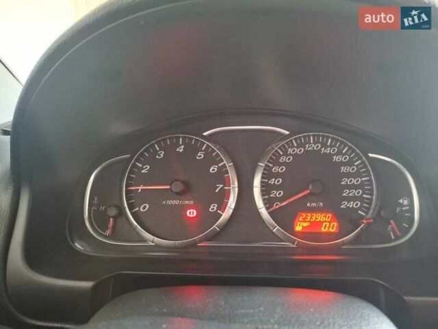 Черный Мазда 6, объемом двигателя 1.8 л и пробегом 234 тыс. км за 5000 $, фото 1 на Automoto.ua