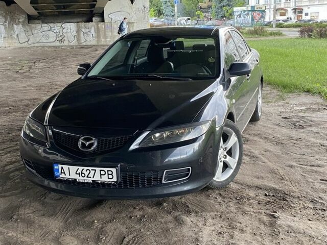 Черный Мазда 6, объемом двигателя 2 л и пробегом 300 тыс. км за 3900 $, фото 1 на Automoto.ua