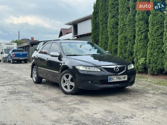 Чорний Мазда 6, об'ємом двигуна 2 л та пробігом 240 тис. км за 3199 $, фото 1 на Automoto.ua