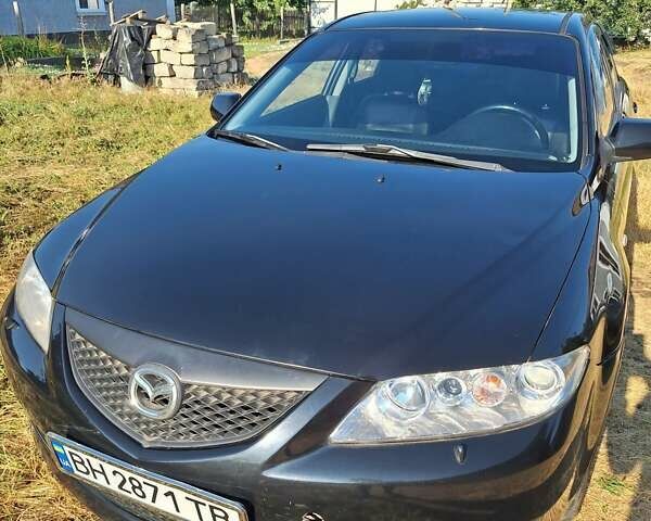 Черный Мазда 6, объемом двигателя 2 л и пробегом 218 тыс. км за 5000 $, фото 1 на Automoto.ua