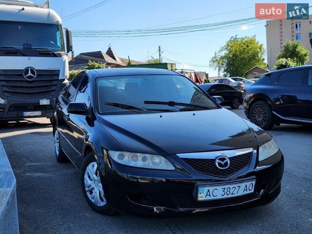Черный Мазда 6, объемом двигателя 1.82 л и пробегом 356 тыс. км за 1550 $, фото 1 на Automoto.ua