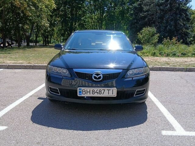 Черный Мазда 6, объемом двигателя 2 л и пробегом 286 тыс. км за 5500 $, фото 1 на Automoto.ua