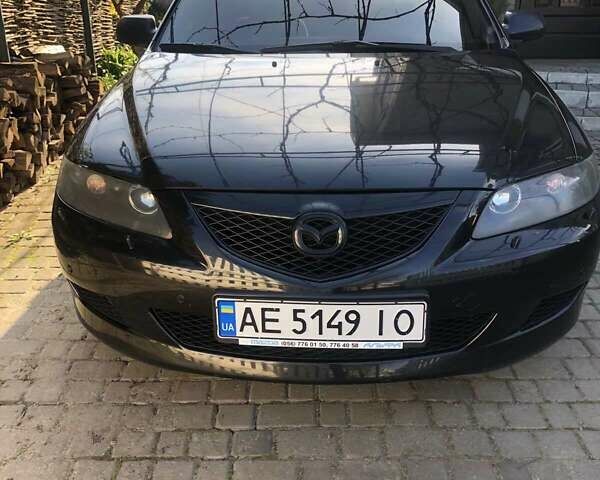 Черный Мазда 6, объемом двигателя 2 л и пробегом 120 тыс. км за 6374 $, фото 1 на Automoto.ua
